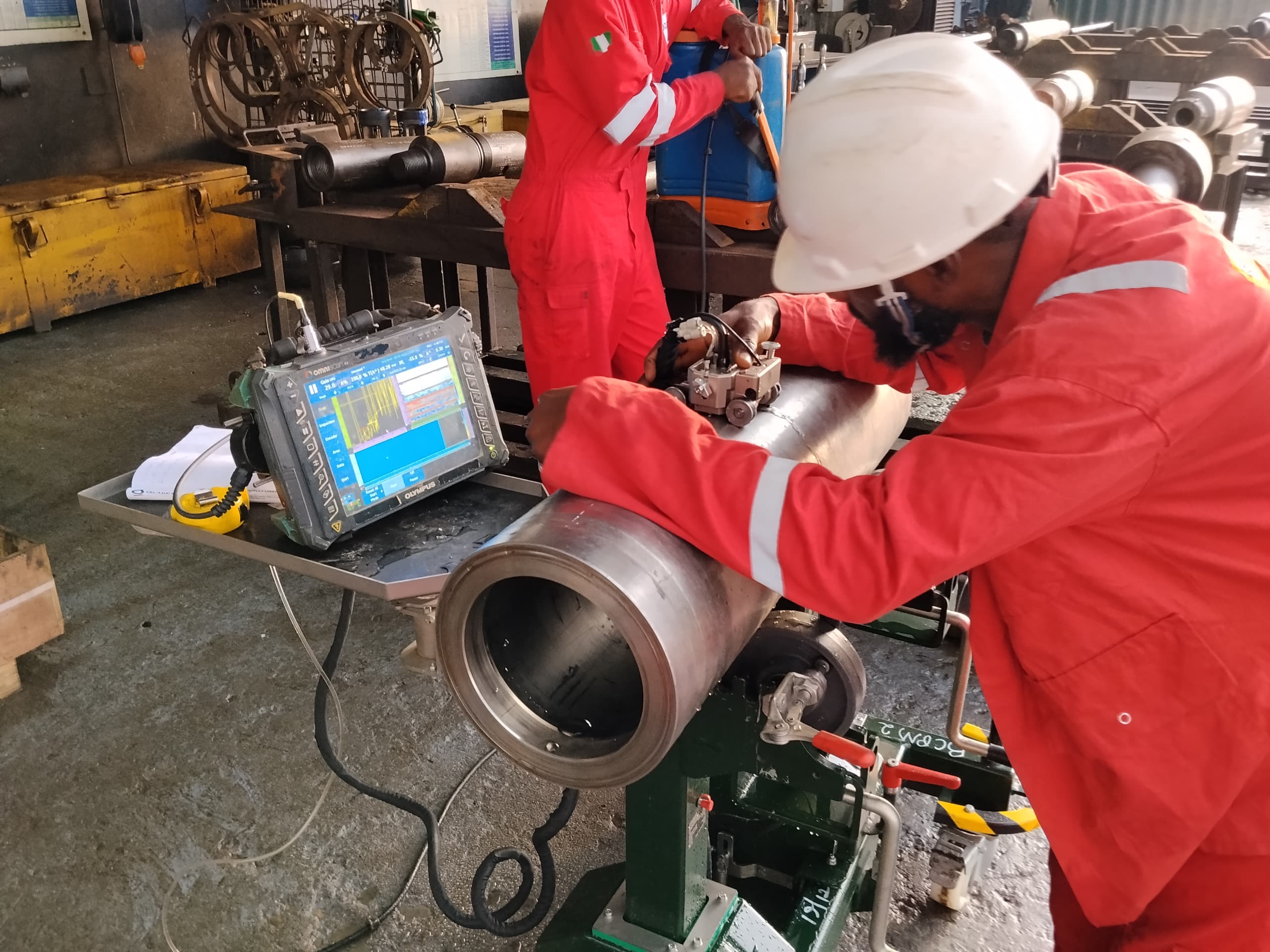 Zeclipse Integrity technicians performing PAUT corrosion mapping on a pipe spool